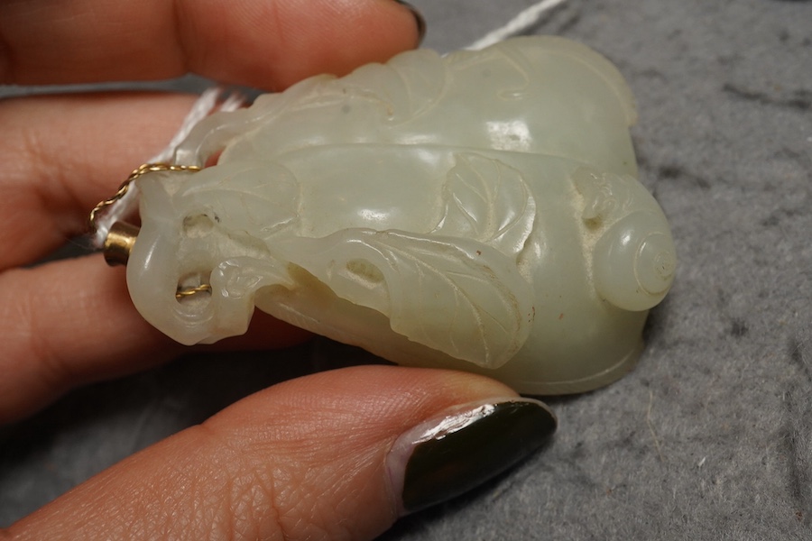 A Chinese pale celadon jade twin gourd pendant, 18th century